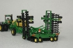 Afbeeldingen van John Deere 9320 met zaaimachine en zaadw